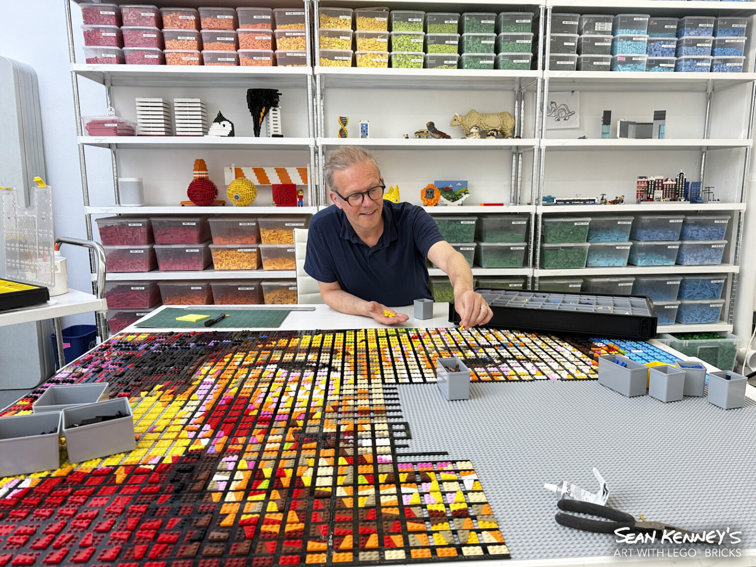 Sean working in his studio.  Creating art with LEGO bricks in a LEGO studio.