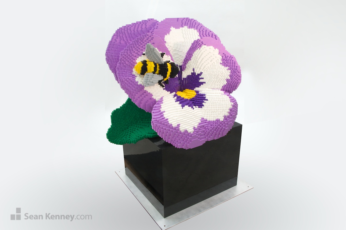 Pansy-and-bee LEGO art by Sean Kenney