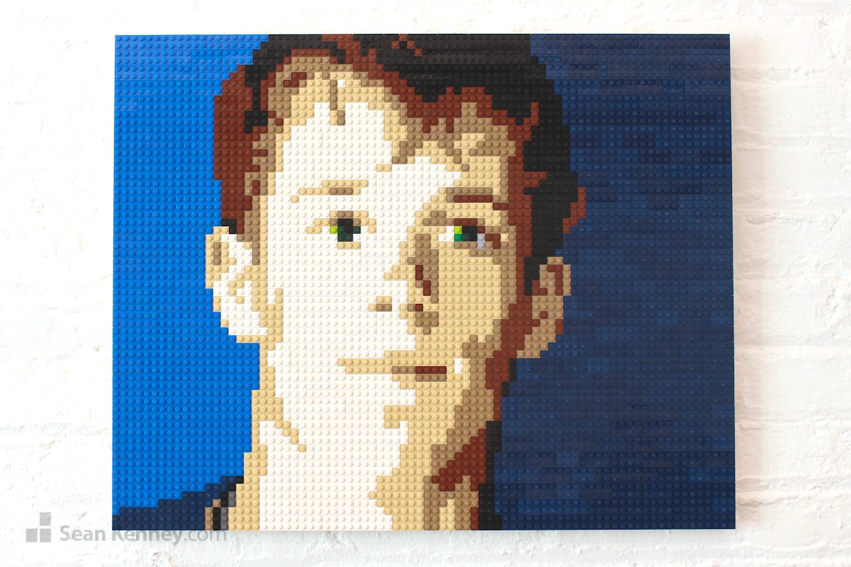 Young-man-on-blue LEGO art by Sean Kenney