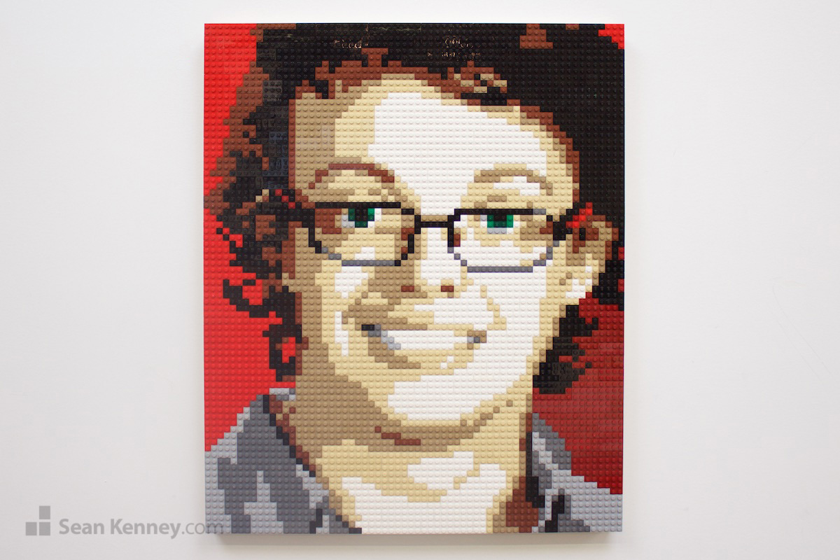 Boy-with-curly-hair-and-glasses LEGO art by Sean Kenney