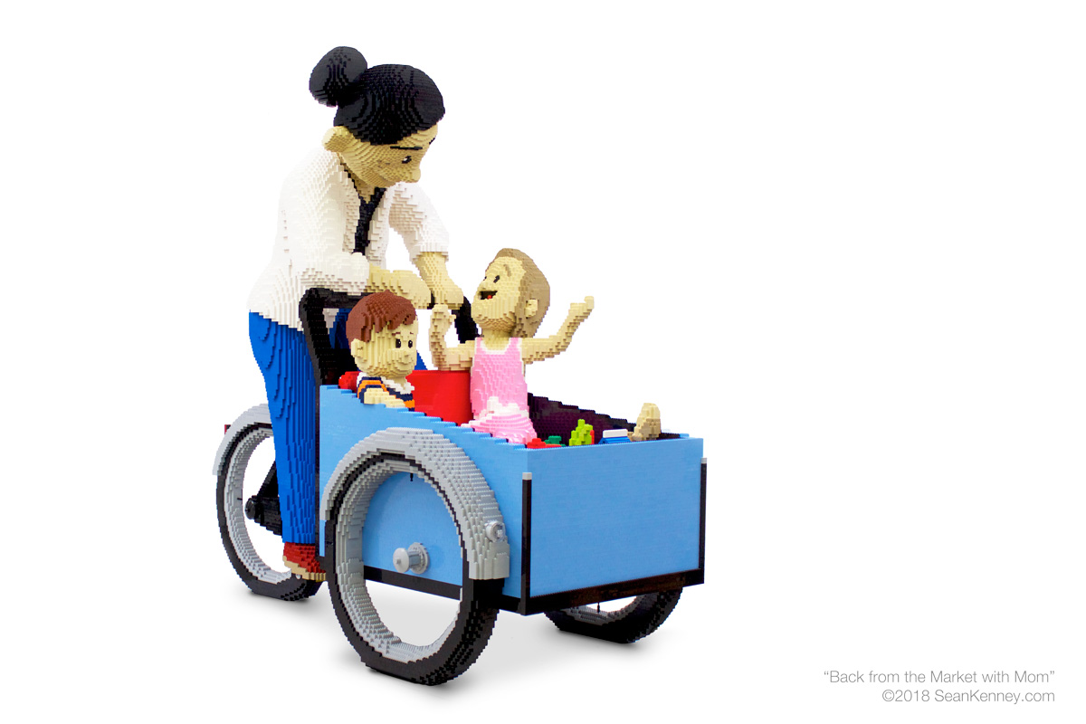 Back-from-the-market-with-mom LEGO art by Sean Kenney