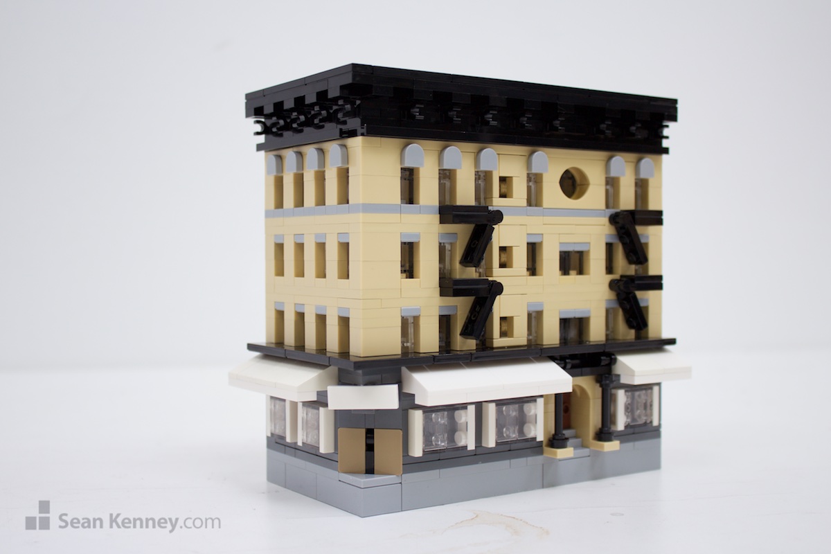 Not-quite-building-on-bond LEGO art by Sean Kenney