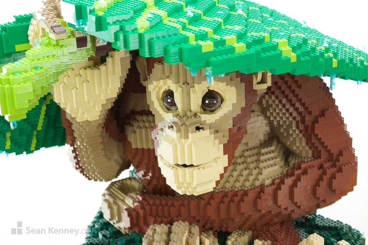 Orangutan-in-the-rain LEGO art by Sean Kenney